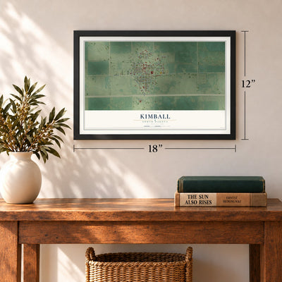 Kimball, South Dakota map, 12 x 18 inch print in a black frame in an entryway