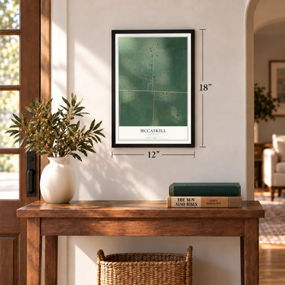 McCaskill, Arkansas map, 12 x 18 inch print in a black frame in an entryway