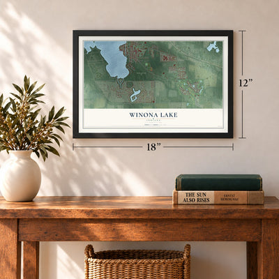 Winona Lake, Indiana map, 12 x 18 inch print in a black frame in an entryway