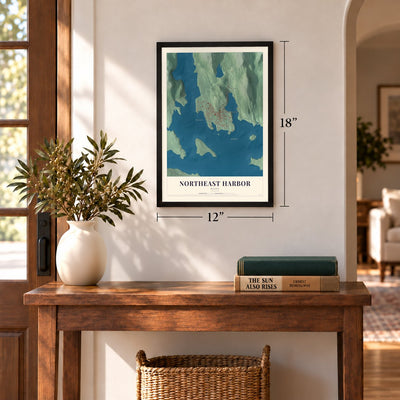 Northeast Harbor, Maine map, 12 x 18 inch print in a black frame in an entryway