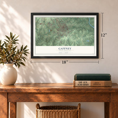 Gaffney, South Carolina map, 12 x 18 inch print in a black frame in an entryway