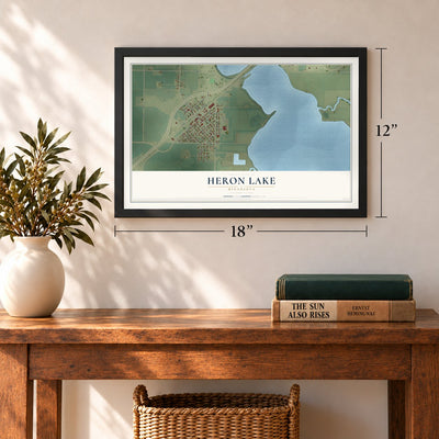 Heron Lake, Minnesota map, 12 x 18 inch print in a black frame in an entryway
