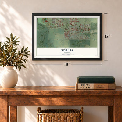 Sisters, Oregon map, 12 x 18 inch print in a black frame in an entryway