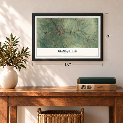 Bloomfield, Kentucky map, 12 x 18 inch print in a black frame in an entryway