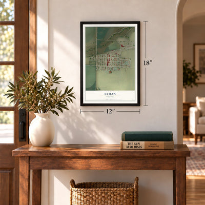 Lyman, Nebraska map, 12 x 18 inch print in a black frame in an entryway