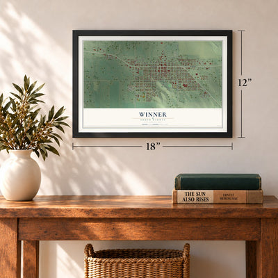 Winner, South Dakota map, 12 x 18 inch print in a black frame in an entryway