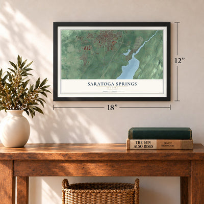 Saratoga Springs, New York map, 12 x 18 inch print in a black frame in an entryway