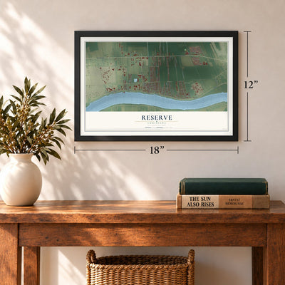 Reserve, Louisiana map, 12 x 18 inch print in a black frame in an entryway