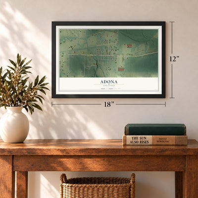 Adona, Arkansas map, 12 x 18 inch print in a black frame in an entryway