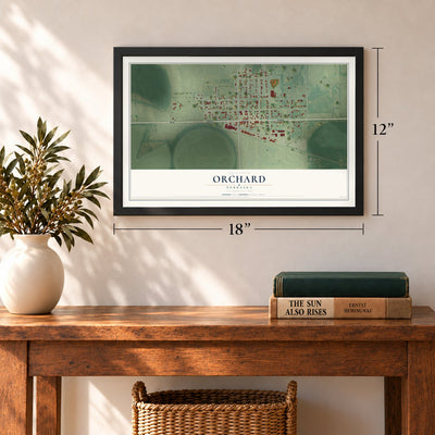 Orchard, Nebraska map, 12 x 18 inch print in a black frame in an entryway