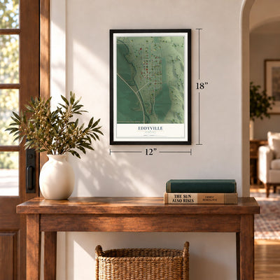 Eddyville, Nebraska map, 12 x 18 inch print in a black frame in an entryway