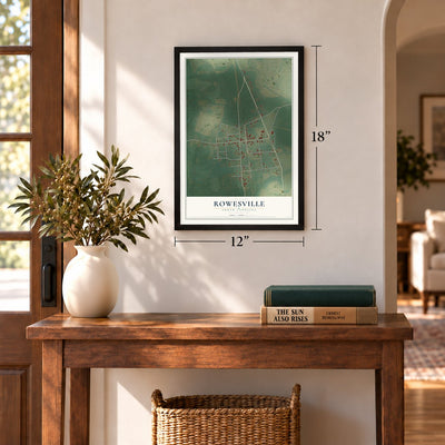 Rowesville, South Carolina map, 12 x 18 inch print in a black frame in an entryway