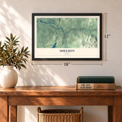 Sheldon, Vermont map, 12 x 18 inch print in a black frame in an entryway