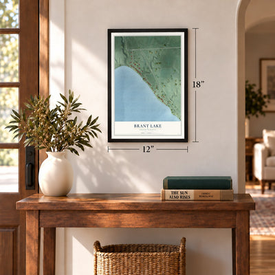 Brant Lake, South Dakota map, 12 x 18 inch print in a black frame in an entryway