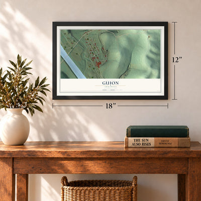 Guion, Arkansas map, 12 x 18 inch print in a black frame in an entryway