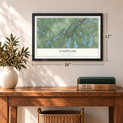 Nashwauk, Minnesota map, 12 x 18 inch print in a black frame in an entryway