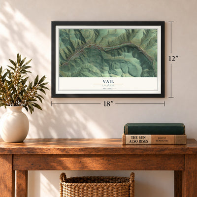 Vail, Colorado map, 12 x 18 inch print in a black frame in an entryway