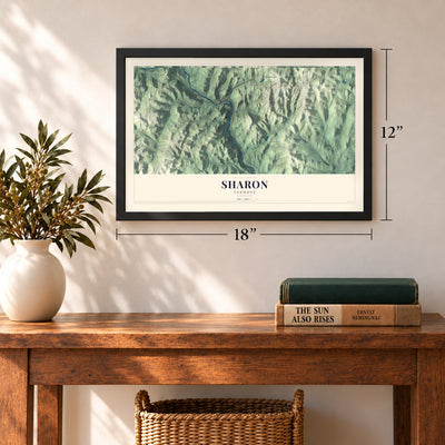 Sharon, Vermont map, 12 x 18 inch print in a black frame in an entryway
