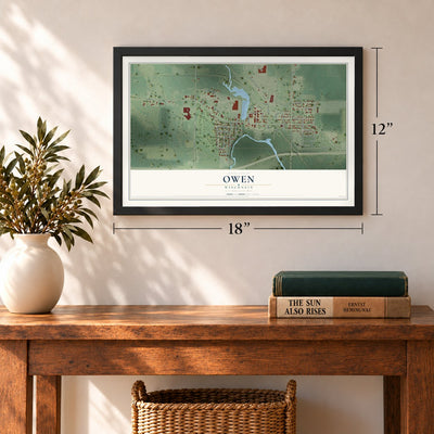 Owen, Wisconsin map, 12 x 18 inch print in a black frame in an entryway