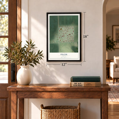 Pilger, Nebraska map, 12 x 18 inch print in a black frame in an entryway
