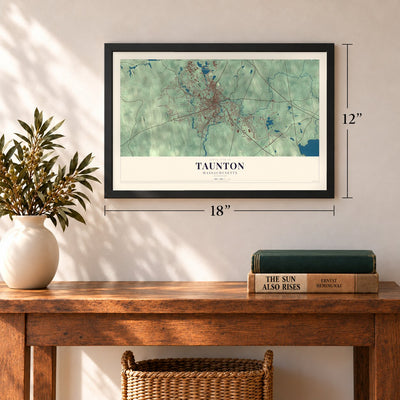 Taunton, Massachusetts map, 12 x 18 inch print in a black frame in an entryway