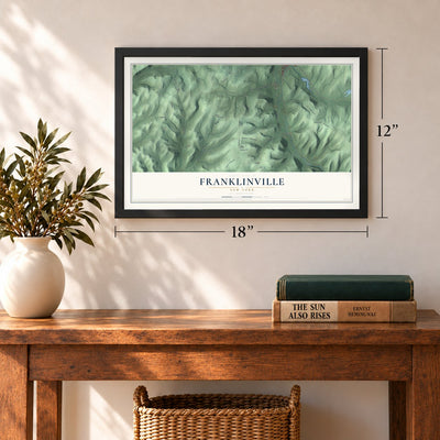 Franklinville, New York map, 12 x 18 inch print in a black frame in an entryway