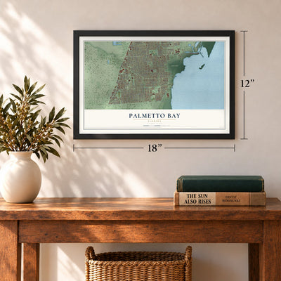 Palmetto Bay, Florida map, 12 x 18 inch print in a black frame in an entryway