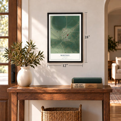 Whitney, Nebraska map, 12 x 18 inch print in a black frame in an entryway