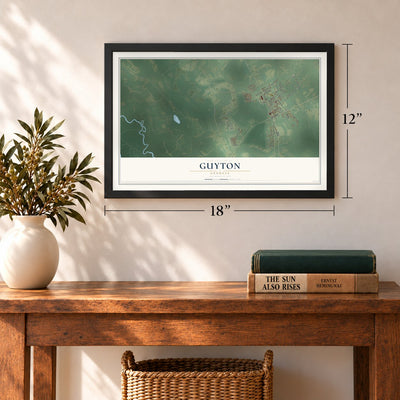 Guyton, Georgia map, 12 x 18 inch print in a black frame in an entryway