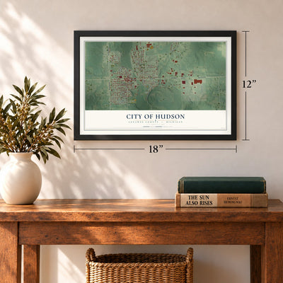 Hudson, Michigan map, 12 x 18 inch print in a black frame in an entryway