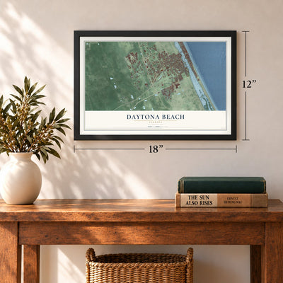 Daytona Beach, Florida map, 12 x 18 inch print in a black frame in an entryway