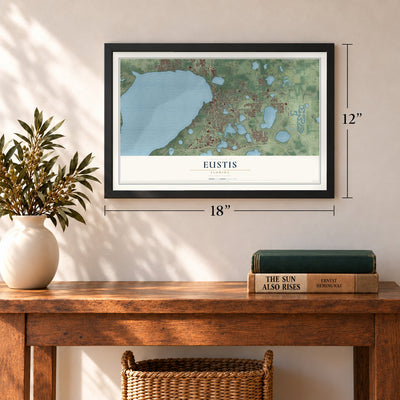Eustis, Florida map, 12 x 18 inch print in a black frame in an entryway