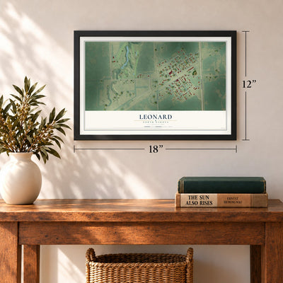 Leonard, North Dakota map, 12 x 18 inch print in a black frame in an entryway