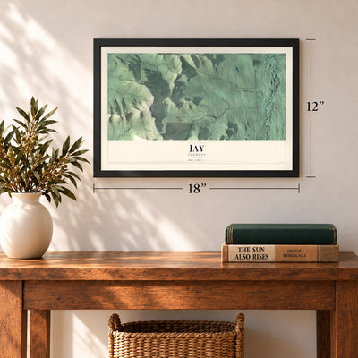Jay, Vermont map, 12 x 18 inch print in a black frame in an entryway
