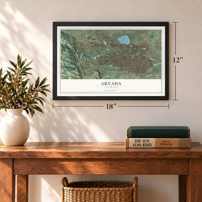 Arvada, Colorado map, 12 x 18 inch print in a black frame in an entryway