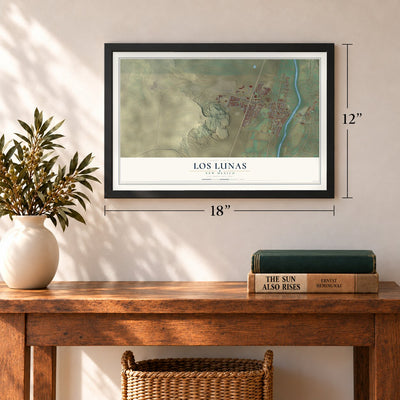 Los Lunas, New Mexico map, 12 x 18 inch print in a black frame in an entryway