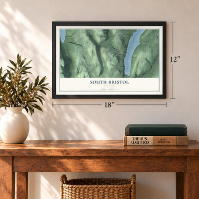 South Bristol, New York map, 12 x 18 inch print in a black frame in an entryway