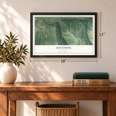 Keystone, Colorado map, 12 x 18 inch print in a black frame in an entryway