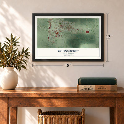 Woonsocket, South Dakota map, 12 x 18 inch print in a black frame in an entryway