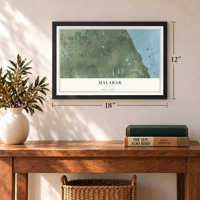 Malabar, Florida map, 12 x 18 inch print in a black frame in an entryway
