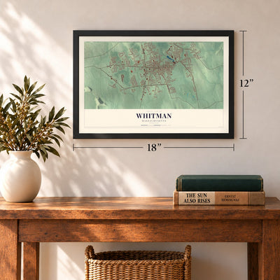Whitman, Massachusetts map, 12 x 18 inch print in a black frame in an entryway