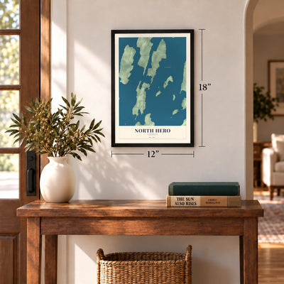 North Hero, Vermont map, 12 x 18 inch print in a black frame in an entryway