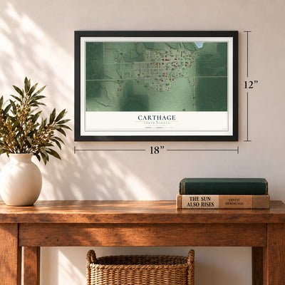 Carthage, South Dakota map, 12 x 18 inch print in a black frame in an entryway