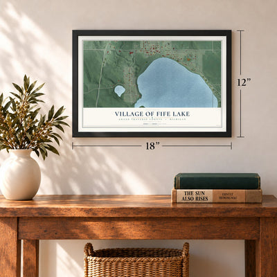 Fife Lake, Michigan map, 12 x 18 inch print in a black frame in an entryway
