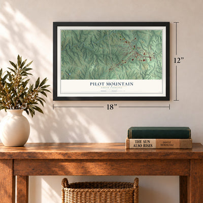 Pilot Mountain, North Carolina map, 12 x 18 inch print in a black frame in an entryway