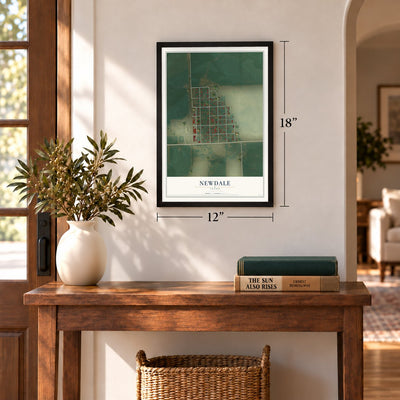Newdale, Idaho map, 12 x 18 inch print in a black frame in an entryway