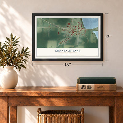 Conneaut Lake, Pennsylvania map, 12 x 18 inch print in a black frame in an entryway