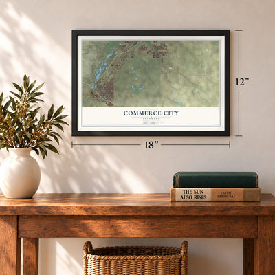 Commerce City, Colorado map, 12 x 18 inch print in a black frame in an entryway