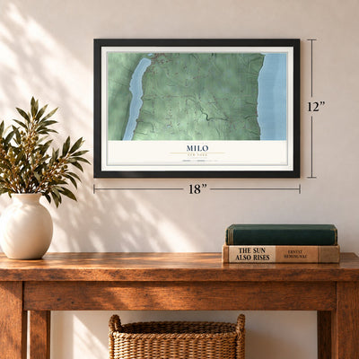 Milo, New York map, 12 x 18 inch print in a black frame in an entryway