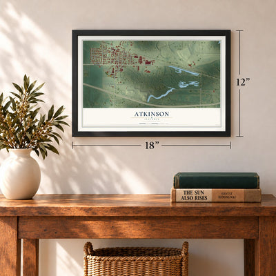 Atkinson, Illinois map, 12 x 18 inch print in a black frame in an entryway
